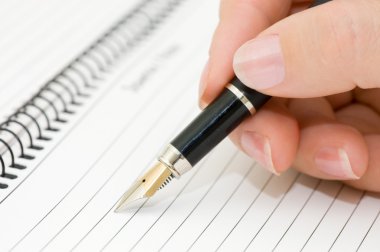 A fountain pen and a document clipart