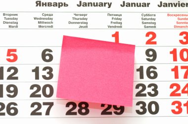 Close up of Post-It Note on Calendar clipart