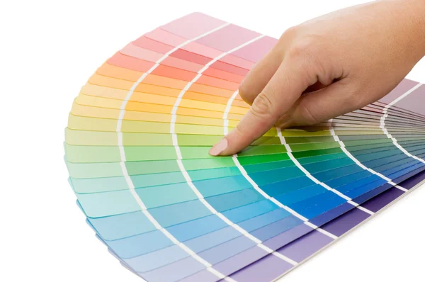 Mão de mulher apontando para uma tabela de cores de amostra — Fotografia de Stock