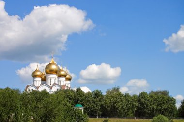 Orthodox church with gold domes clipart