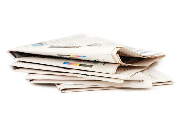 Various newspapers over white background — Stock Photo, Image