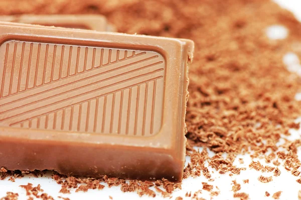 El bloque de chocolate en una miga de chocolate —  Fotos de Stock