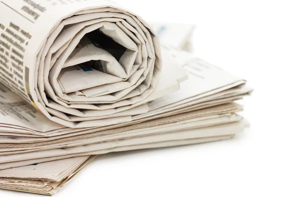 Oll de periódicos, aislados sobre fondo blanco — Foto de Stock