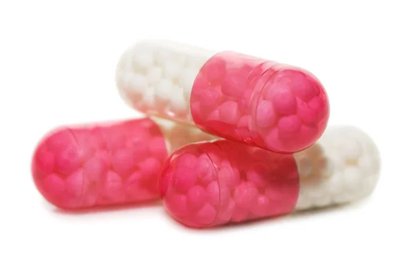 Montón de pastillas aisladas sobre fondo blanco — Foto de Stock
