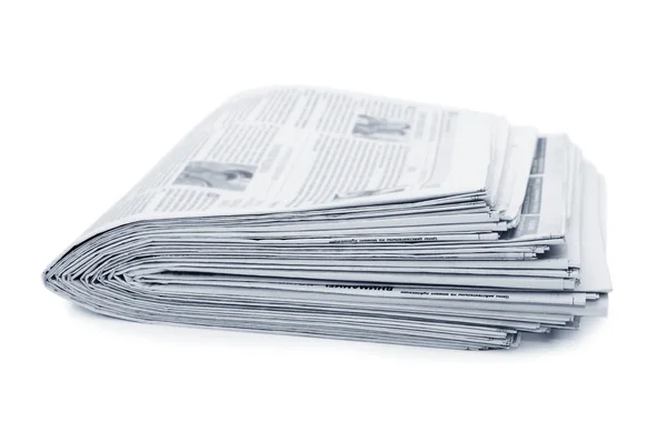 Verschiedene Zeitungen auf weißem Hintergrund — Stockfoto