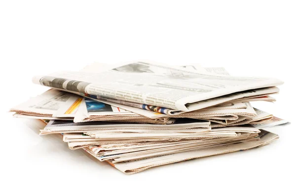 Vários jornais sobre fundo branco — Fotografia de Stock