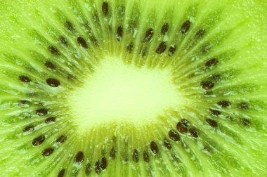 Macro photo of a fresh kiwi clipart