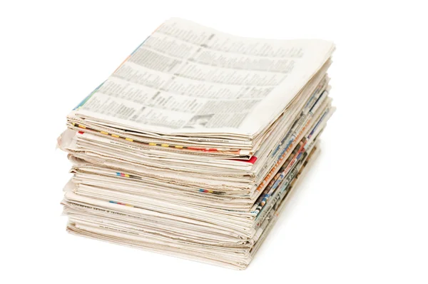 Різні газети на білому тлі — стокове фото