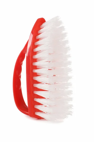 Escova vermelha isolada sobre fundo branco — Fotografia de Stock