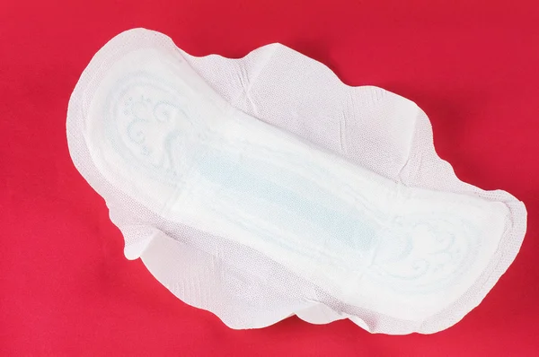 Sanitary Napkin on a red background — Stock Photo, Image