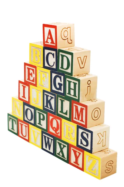 Würfel mit Buchstaben auf weißem Hintergrund — Stockfoto