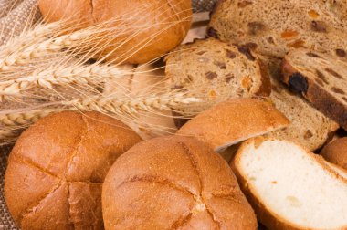Fresh bread with ear of wheat clipart