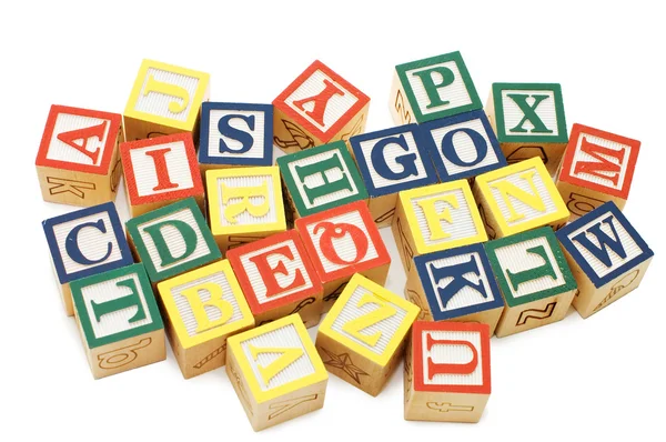 Cubi con lettere isolate su sfondo bianco — Foto Stock