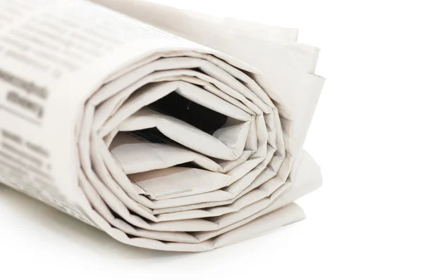 Rotolo di giornali, isolato su sfondo bianco — Foto Stock