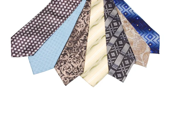 Reihe luxuriöser Krawatten auf weißem Hintergrund — Stockfoto