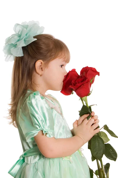 那个拿着一束玫瑰的小女孩 — 图库照片