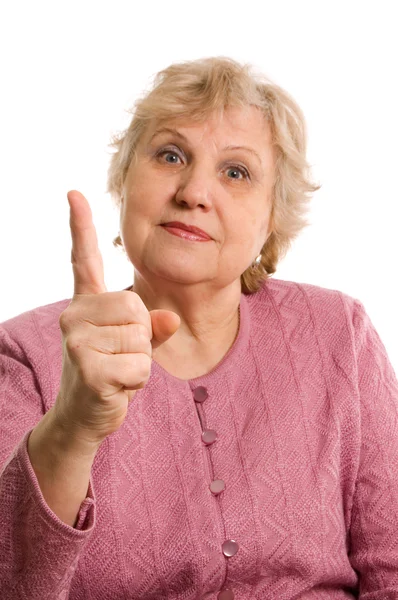 The elderly woman threatens with a finger — Stock Photo, Image