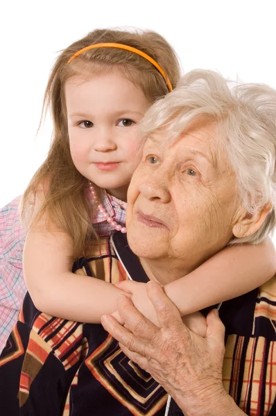 A mulher idosa com a neta — Fotografia de Stock