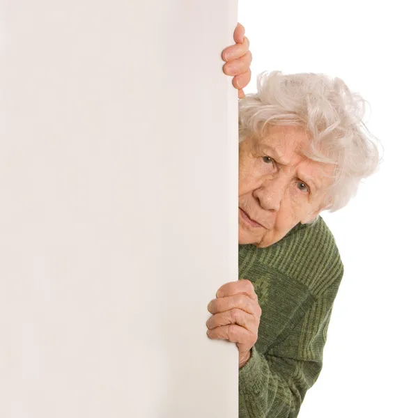 La vecchia donna spia isolata su sfondo bianco — Foto Stock