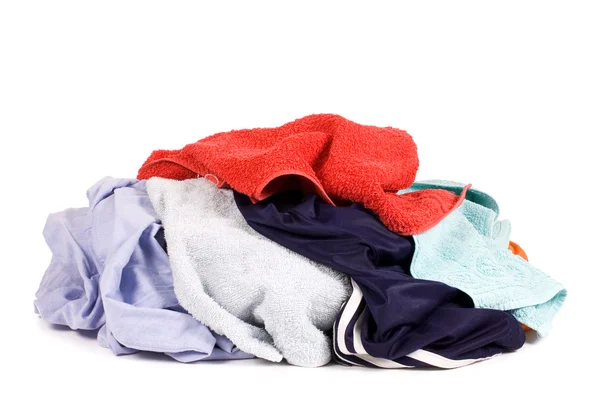 Montón de ropa sucia aislada sobre fondo blanco — Foto de Stock