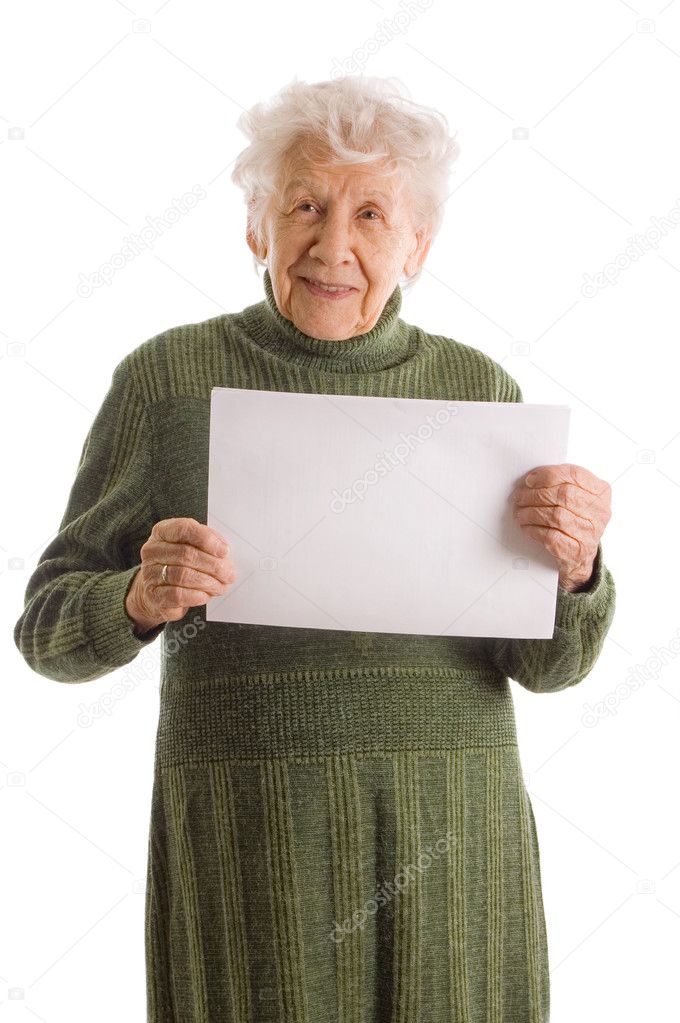 Portrait of a happy senior woman holding blank billboard against