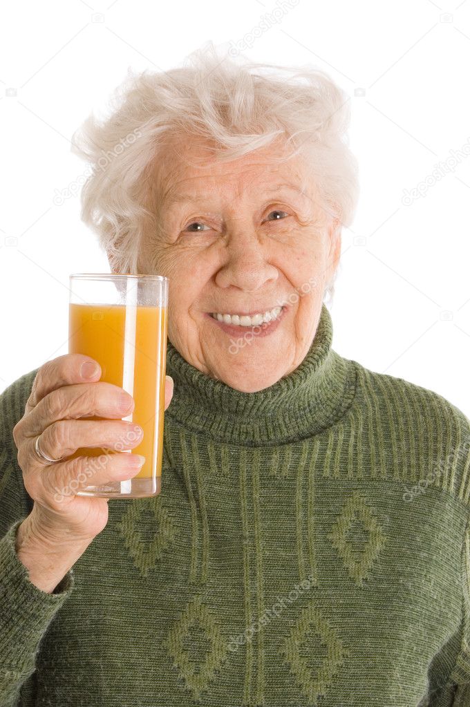 The elderly woman with a juice glass