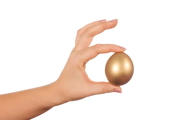 Zlaté vejce v ruce, izolované — Stock fotografie