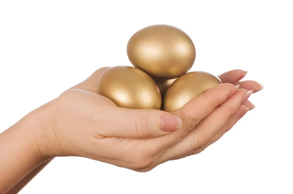 Arany-tojás az elszigetelt kezében — Stock Fotó