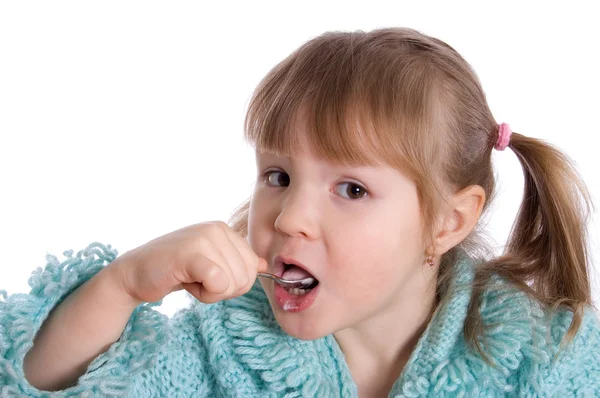 The little girl eats yoghurt — Stock Photo, Image