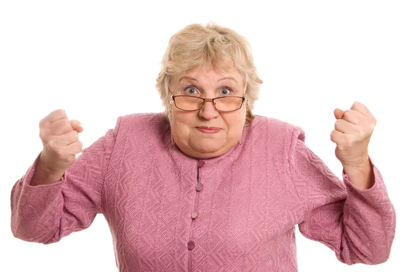 Den äldre kvinnan visar en knytnäve — Stockfoto