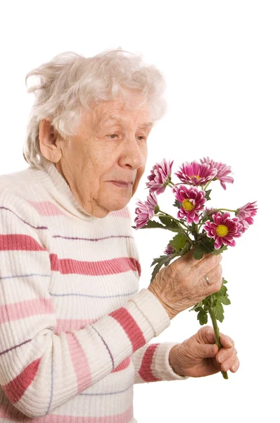 Η γριά με ένα μπουκέτο λουλούδια — Φωτογραφία Αρχείου