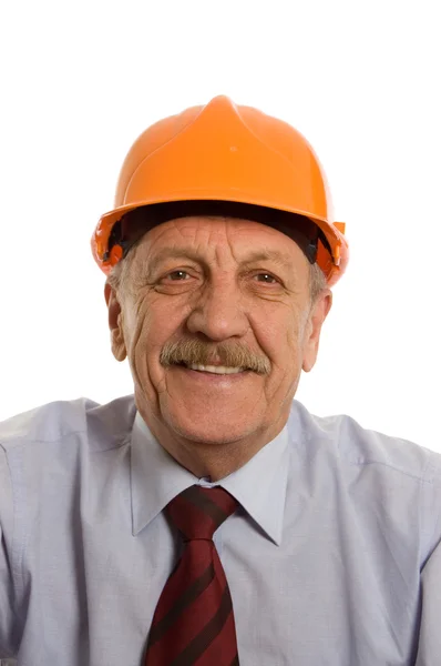 O engenheiro em um capacete isolado em branco — Fotografia de Stock