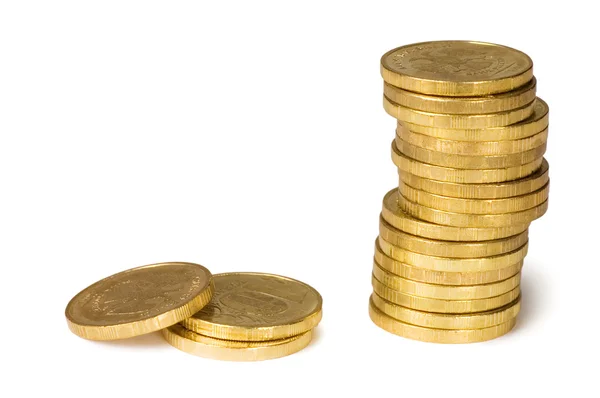 Monedas de oro aisladas sobre fondo blanco — Foto de Stock