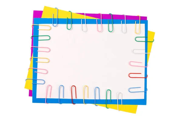 Colour paper with a paper clip — Stock Photo, Image
