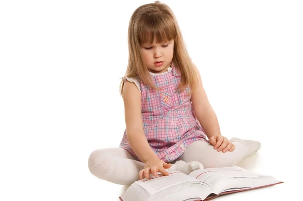 The little girl with the book — Stock Photo, Image