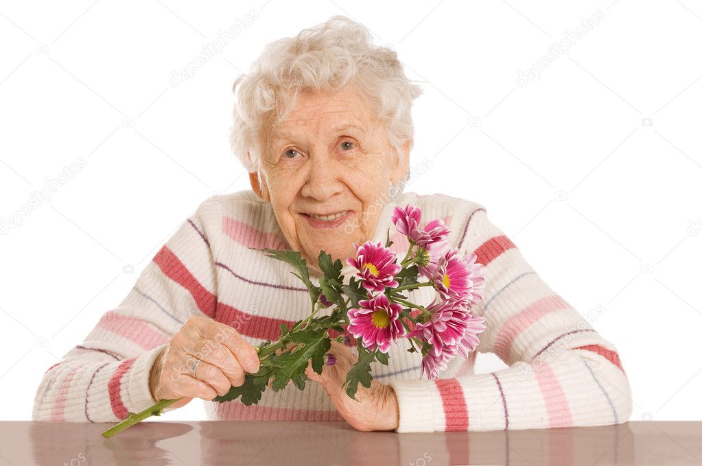 The old woman with a bunch of flowers