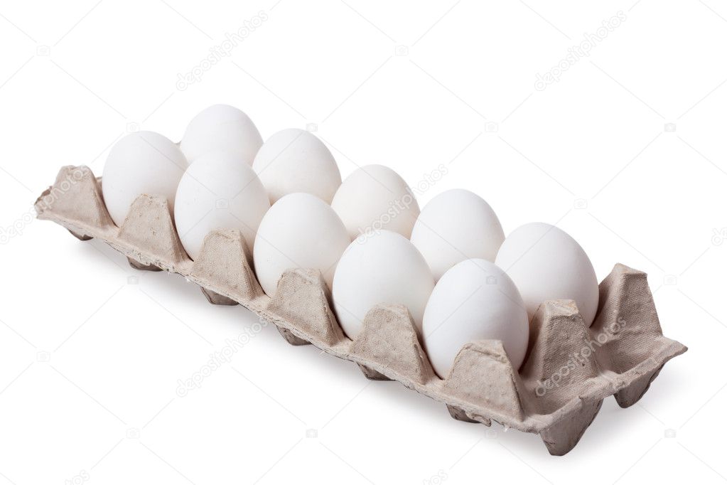 White eggs in carton. Nutritious eating.