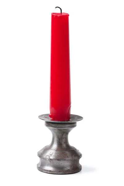 stock image An unlit red candle isolated on the white