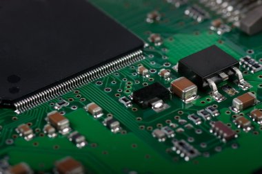 Macro view of electronic circuit board clipart