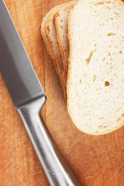 Knife and bread — Stock Photo, Image