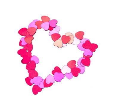 Outline of a heart made with heart-shaped red and pink confetti, isolated on white. clipart