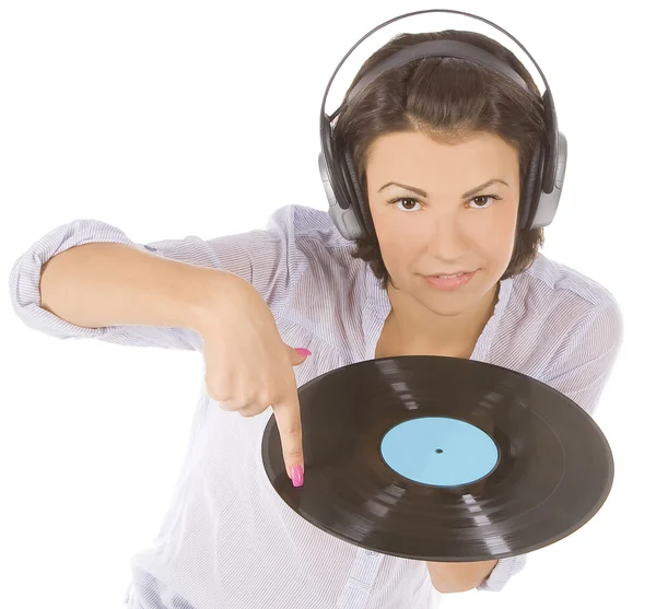 Morena feliz em fones de ouvido com disco de vinil sobre branco — Fotografia de Stock