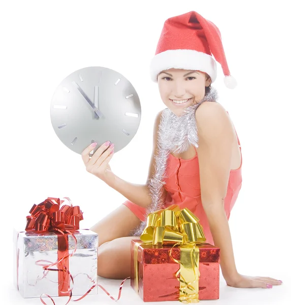 Belle fille Santa avec horloge montrant minuit — Photo