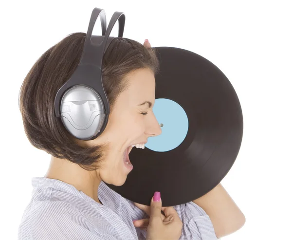 Profil brunette emosional dalam headphone dengan vinyl record ov — Stok Foto