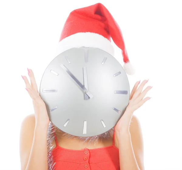 Picture of woman in santa hat with big clock — Stock Photo, Image