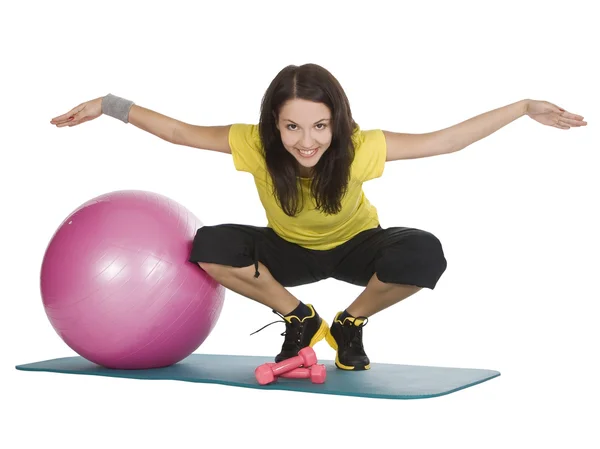 Attraktive junge Frau mit Fitnesshanteln im Sportzentrum — Stockfoto