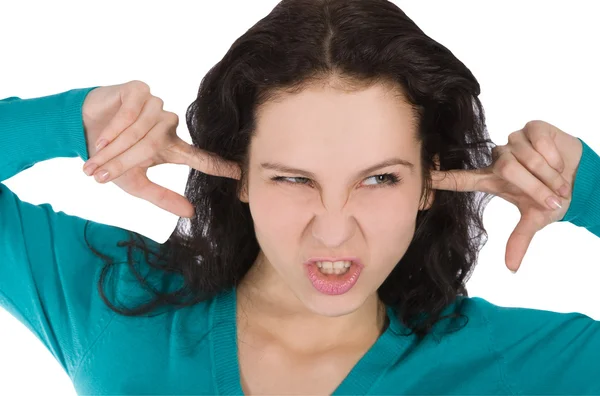 Foto van jonge vrouw met vingers in de oren — Stockfoto