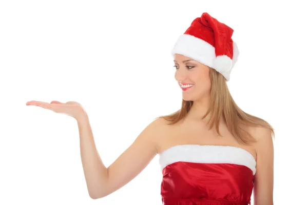 Söt flicka klädd i röd jul hatt — Stockfoto