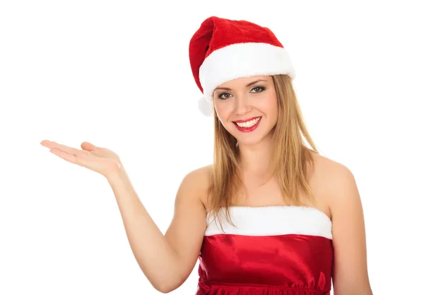Söt flicka klädd i röd jul hatt, håller en hand palm upp. — Stockfoto