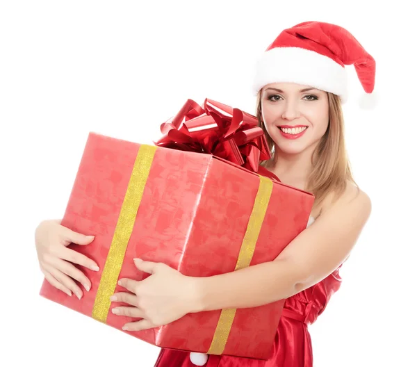 Fröhliches Weihnachtsmann-Helfermädchen mit großer Geschenkbox Stockbild